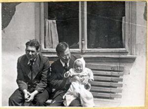 Mikolaj Volosianski with Izek and Anna in front of their house in Drohobych